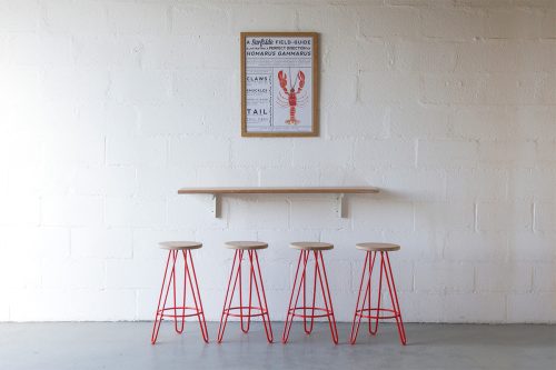 set of hairpin leg bar stools against a breakfast bar