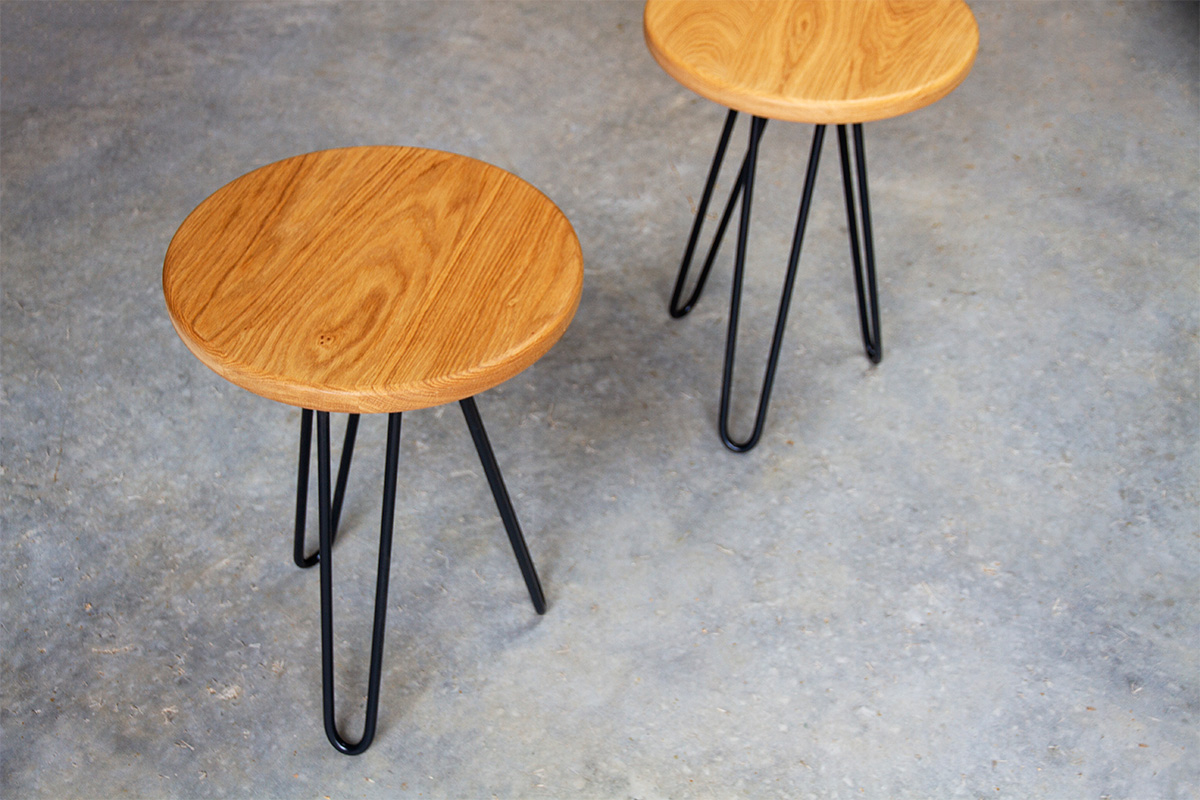 pair of hairpin leg side tables with circular oak table top