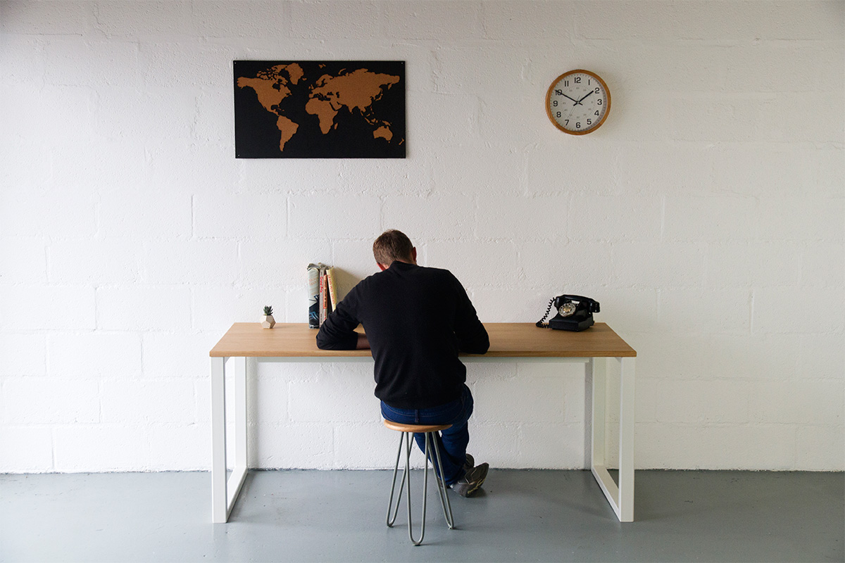 working at a nola oak desk