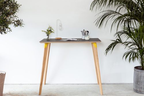 Small Modpop standing desk with grey fenix table top, yellow brackets and solid oak legs